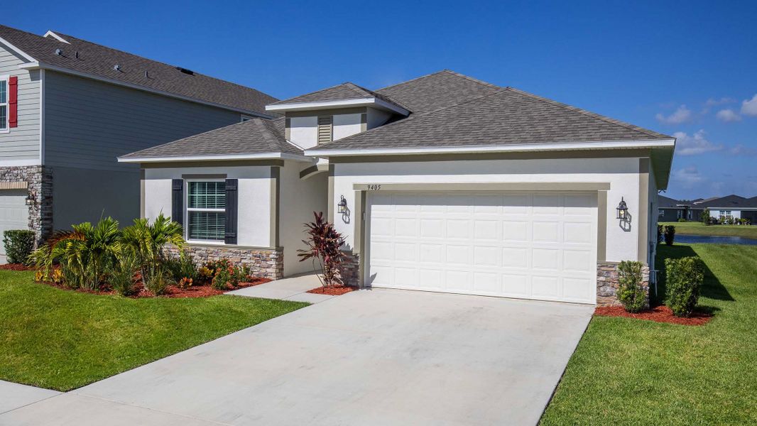 Representative exterior photo of a completed home built from the Miramar by Maronda Homes in Malabar Springs, Palm Bay, FL (Image 21).