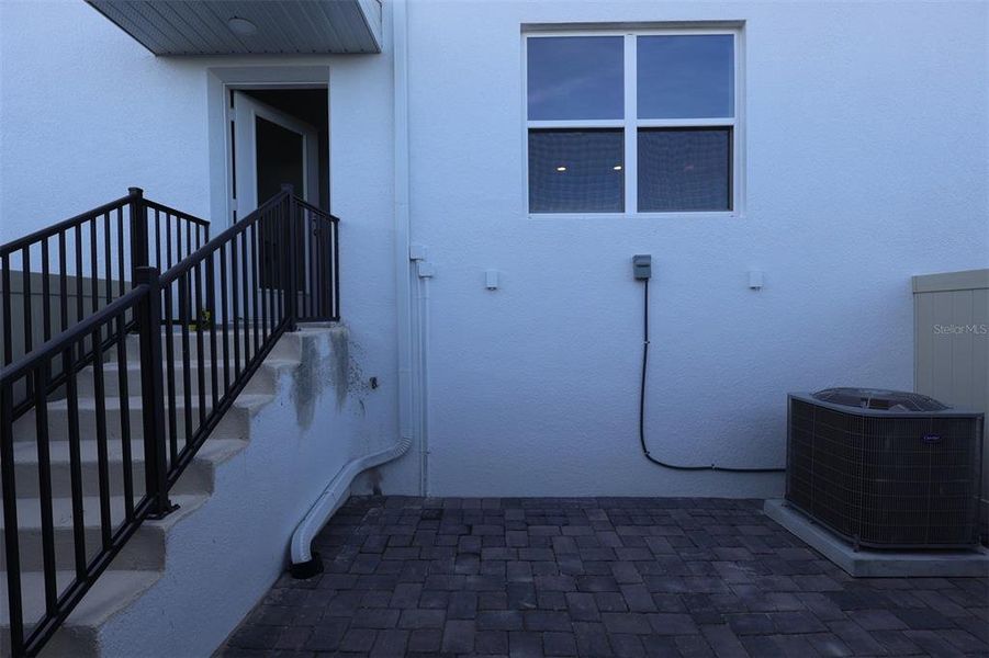 Exterior details and patio area of a home in Tribute at Ovation, Winter Garden (Image 3). Exterior details and patio area of a home in Tribute at Ovation, Winter Garden (Image 3).