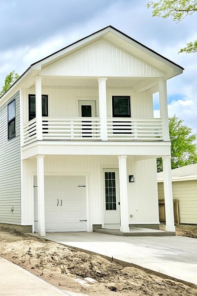 Front exterior of a new home in , North Charleston, SC, highlighting curb appeal (Image 3).