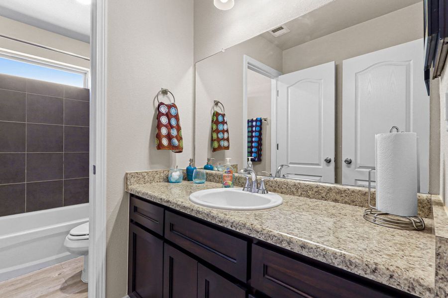 Furnished interior view inside a new home in Rancho Desierto Bello, El Paso (Image 8).