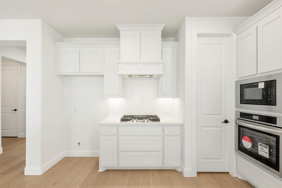 Furnished interior view inside a new home in Painted Tree Woodland District 50, McKinney (Image 4).