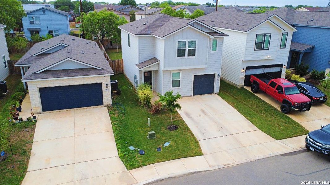 Front exterior of a new home in Blue Ridge Ranch, San Antonio, TX, highlighting curb appeal (Image 21).