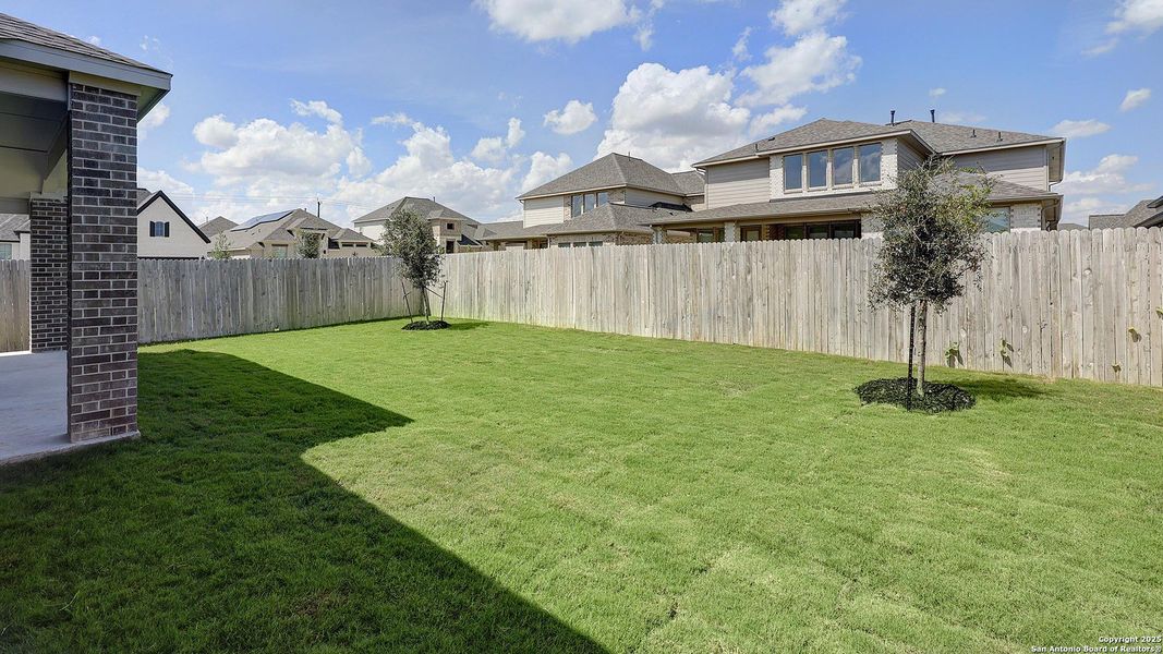 Exterior details and patio area of a home in Kallison Ranch 50', San Antonio (Image 3).