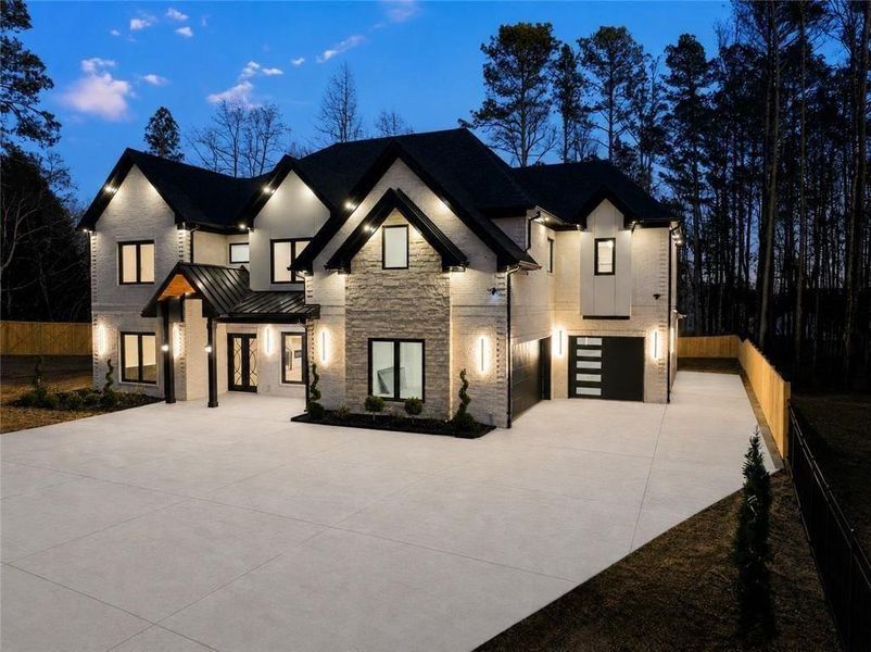 Front exterior of a new home in , Lawrenceville, GA, highlighting curb appeal (Image 28). Front exterior of a new home in , Lawrenceville, GA, highlighting curb appeal (Image 28).
