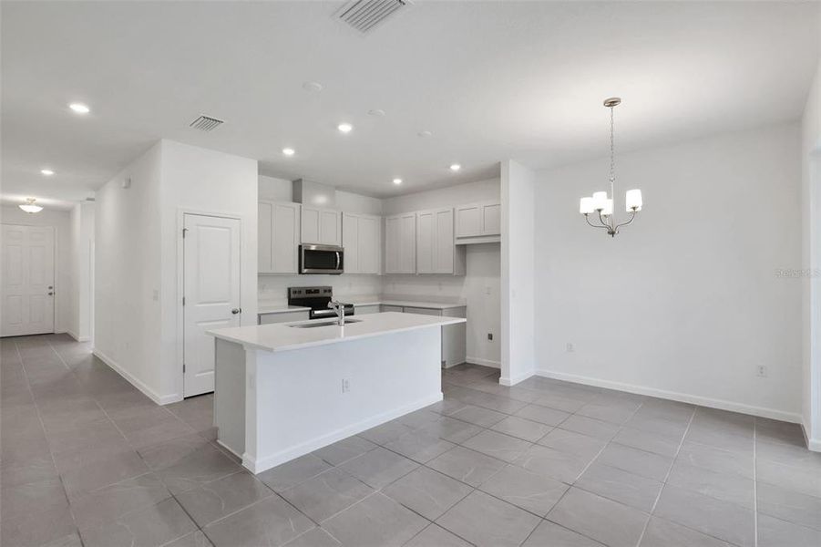 Furnished interior view inside a new home in Seaport Village, Tavares (Image 9).