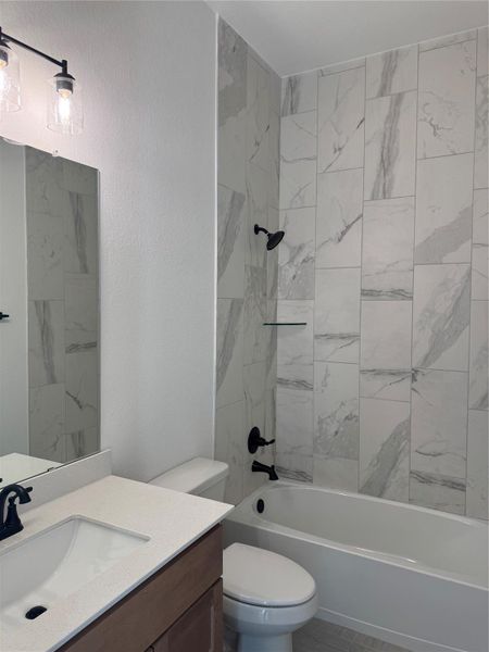 Furnished interior view inside a new home in The Trails, New Caney (Image 3). Furnished interior view inside a new home in The Trails, New Caney (Image 3).