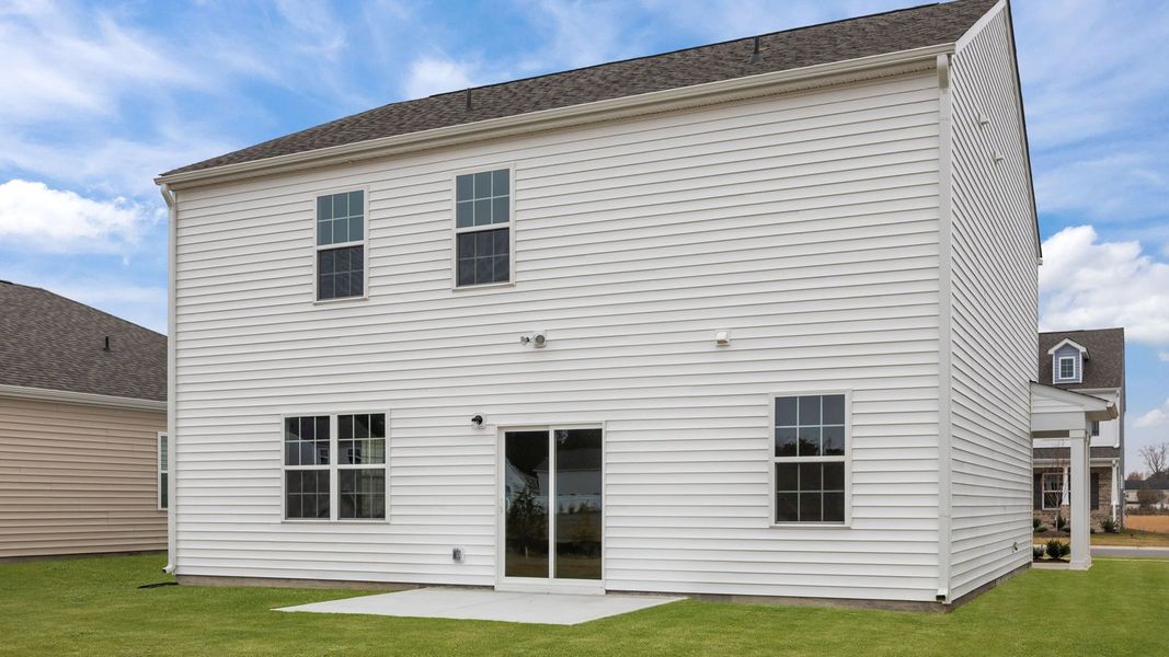 Exterior details and patio area of a home in Ridgewood Farms, Winterville (Image 22).