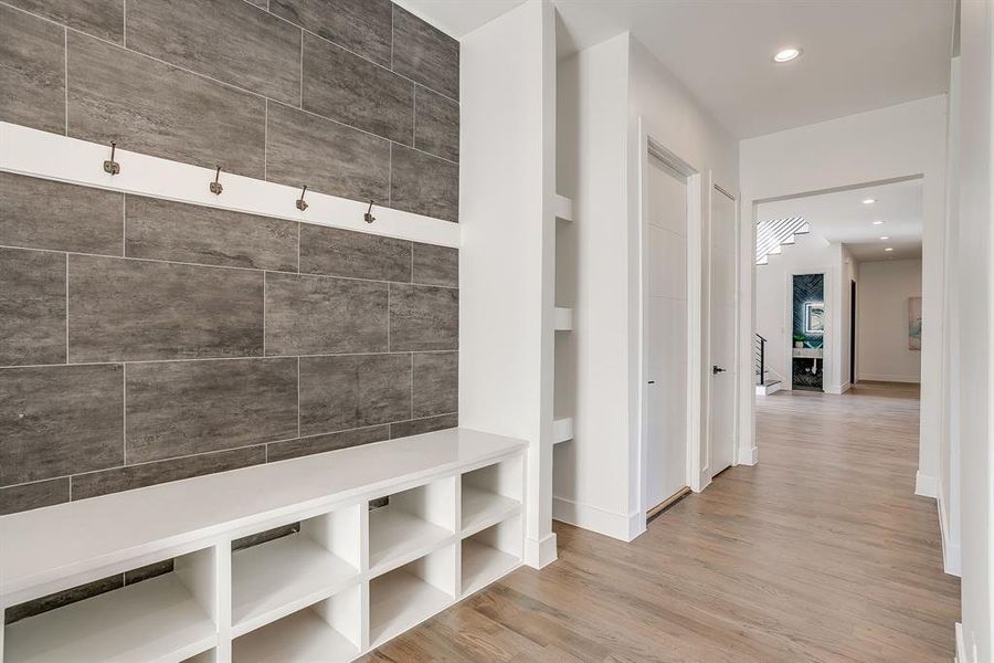 Mudroom with recessed lighting and light wood-style flooring Mudroom with recessed lighting and light wood-style flooring