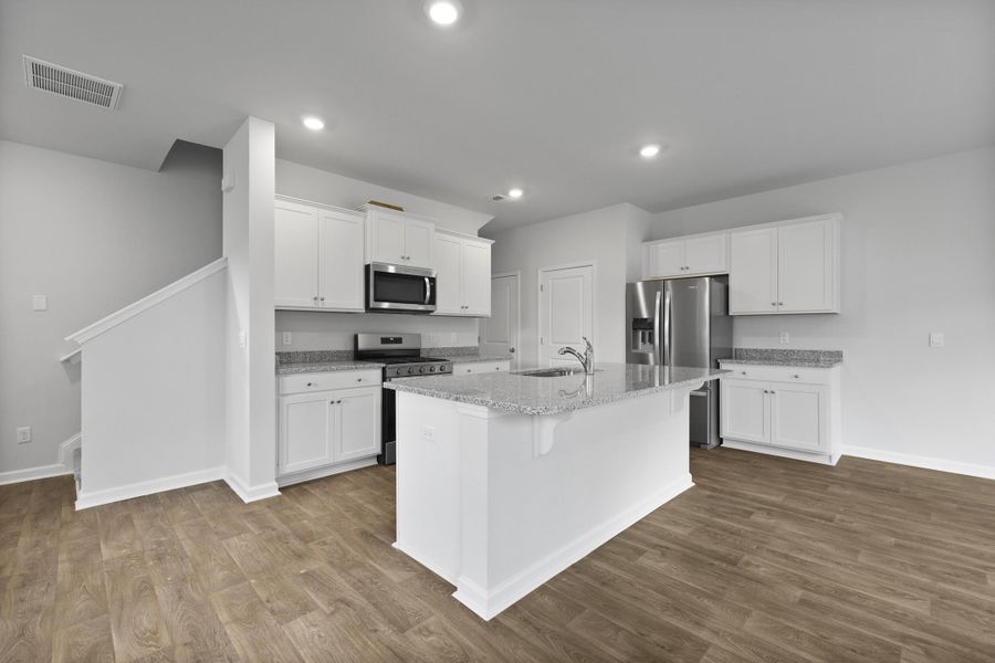 Furnished interior view inside a new home in Pine Hills at Cane Bay, Summerville (Image 7).