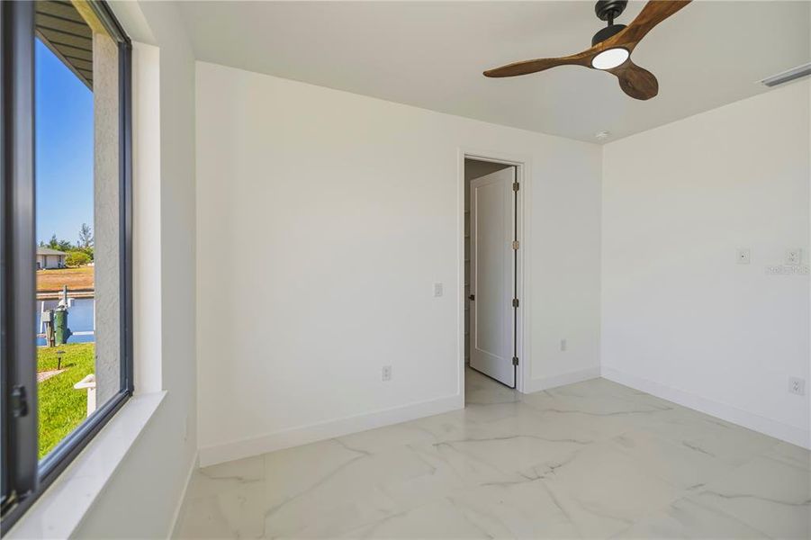 Spacious, unfurnished interior of a new home in , Port Charlotte (Image 53).