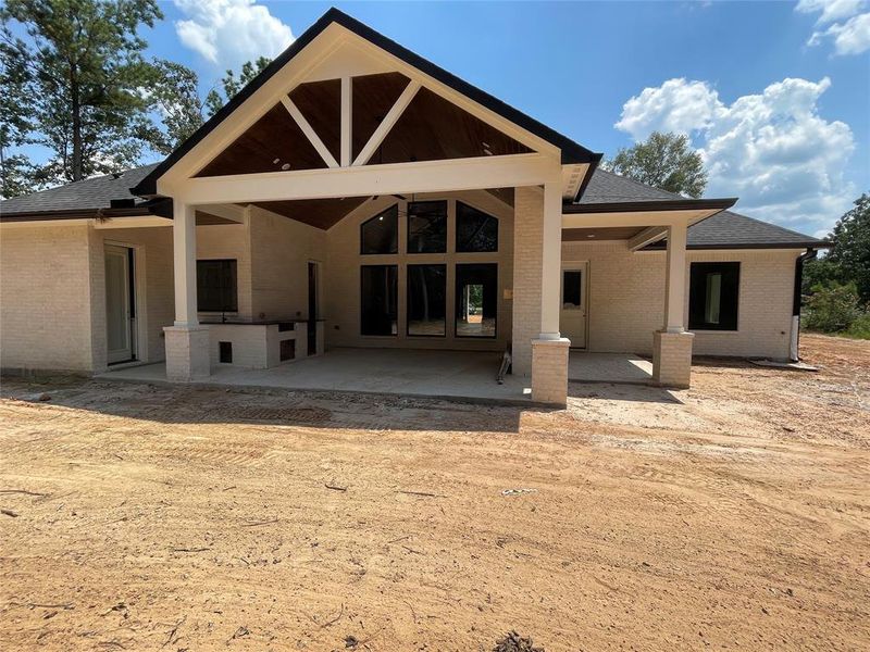 Fabulous outdoor living area with fireplace , outdoor kitchen and full bath.