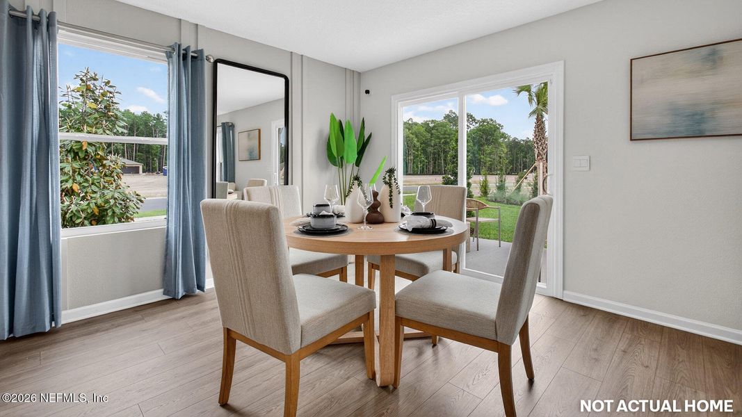 Furnished interior view inside a new home in Sawmill Branch, Palm Coast (Image 5). Furnished interior view inside a new home in Sawmill Branch, Palm Coast (Image 5).