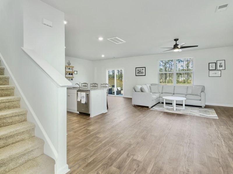 Furnished interior view inside a new home in Pine Hills at Cane Bay, Summerville (Image 10). Furnished interior view inside a new home in Pine Hills at Cane Bay, Summerville (Image 10).