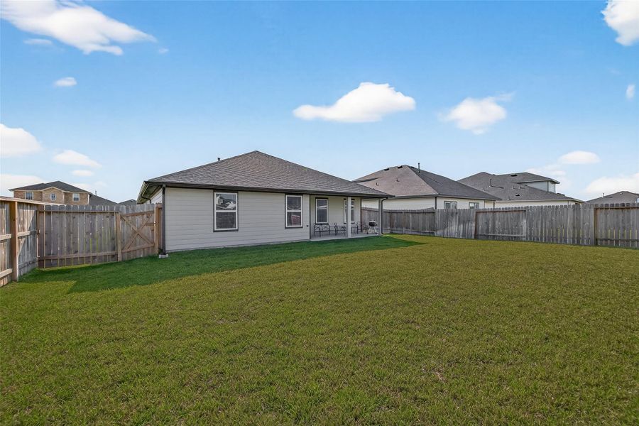 Situated on a generous lot with no rear neighbors, ideal for creating your dream outdoor retreat.