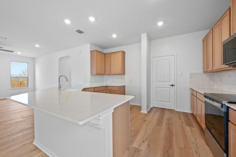 Furnished interior view inside a new home in Overlook Ranch, Georgetown (Image 4).