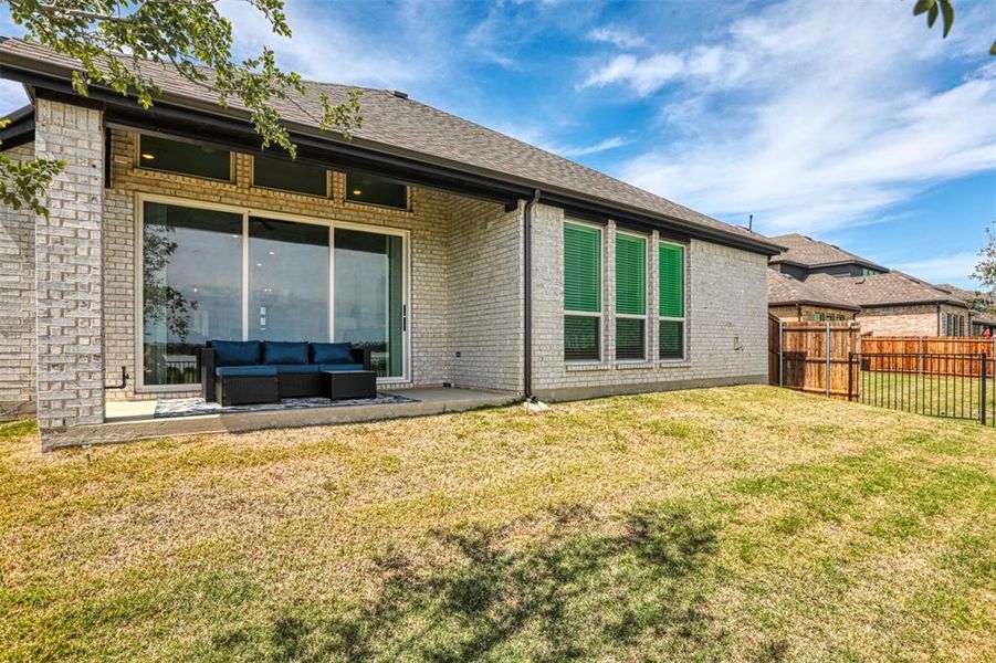 Exterior details and patio area of a home in , Little Elm (Image 23).