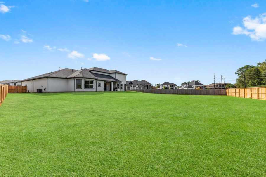 Front exterior of a new home in , Spring, TX, highlighting curb appeal (Image 21). Front exterior of a new home in , Spring, TX, highlighting curb appeal (Image 21).