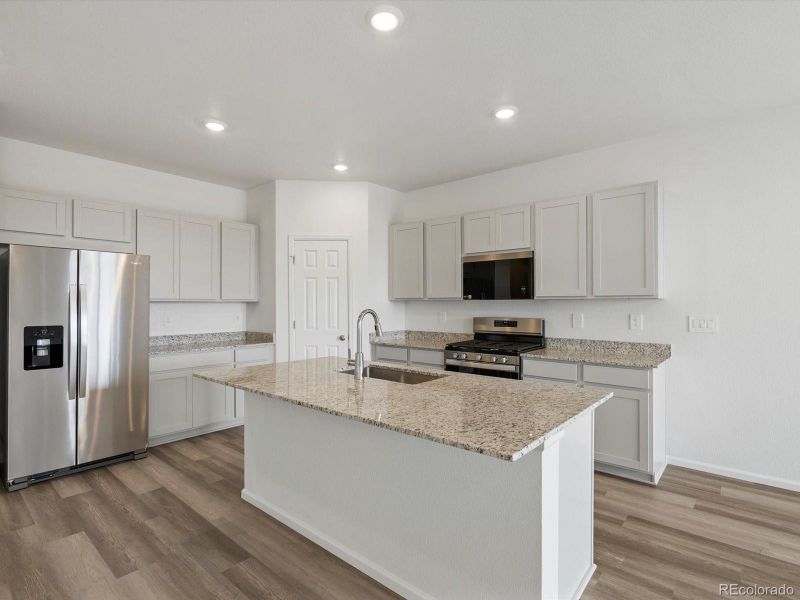 Furnished interior view inside a new home in Buffalo Highlands: The Canyon Collection, Commerce City (Image 11).