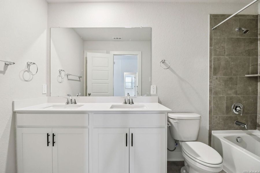 Furnished interior view inside a new home in Thomas Pond, San Antonio (Image 9).