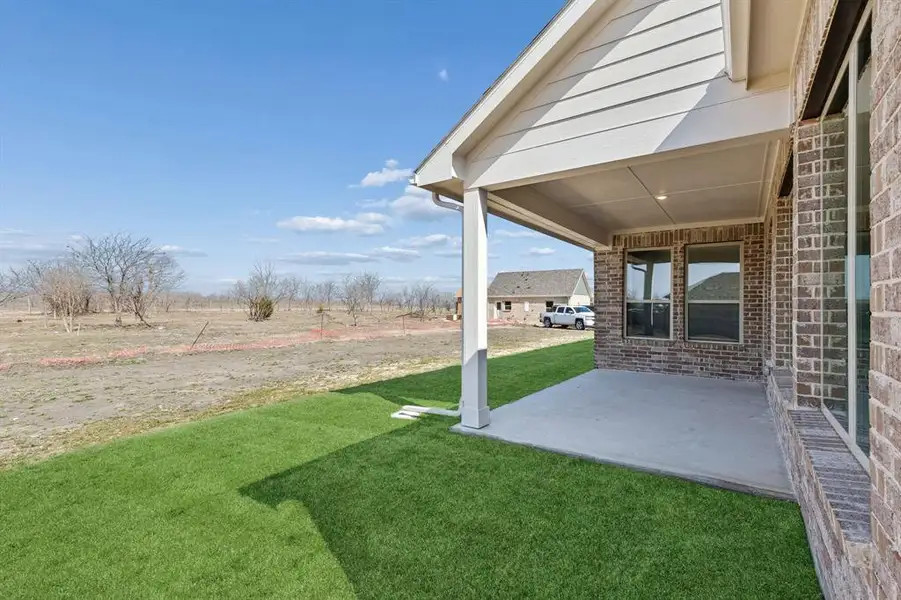 Exterior details and patio area of a home in Ellis Ranch Estates, Waxahachie (Image 3). Exterior details and patio area of a home in Ellis Ranch Estates, Waxahachie (Image 3).