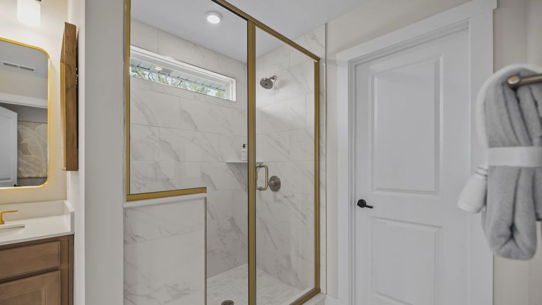 The Stonefield Home Plan in Michaux Garden by DRB Homes in Belmont, NC. - Primary Bathroom
