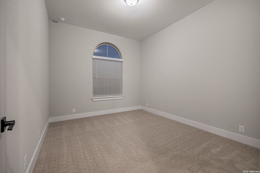 Spacious, unfurnished interior of a new home in The Reserve at Potranco Oaks, Castroville (Image 23).
