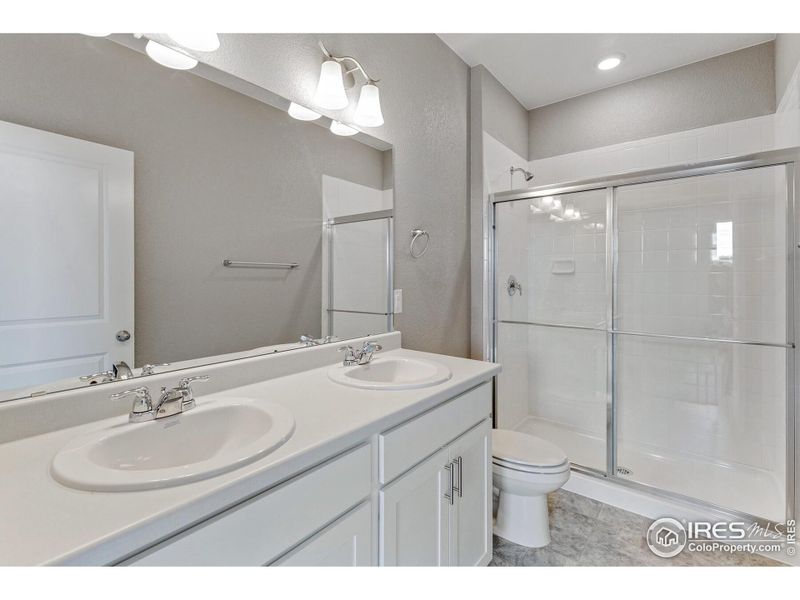 Furnished interior view inside a new home in Silver Peaks, Lochbuie (Image 9).