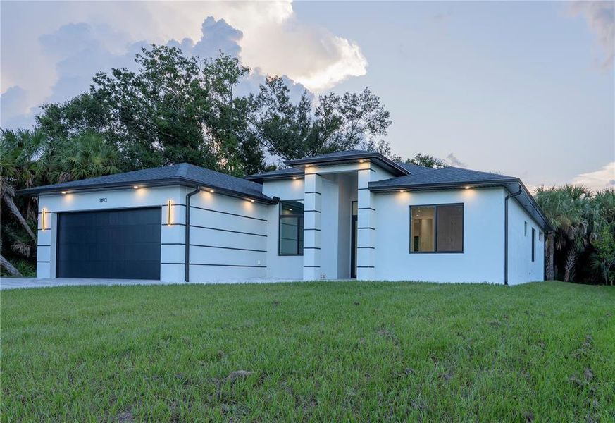 Front exterior of a new home in , North Port, FL, highlighting curb appeal (Image 35).
