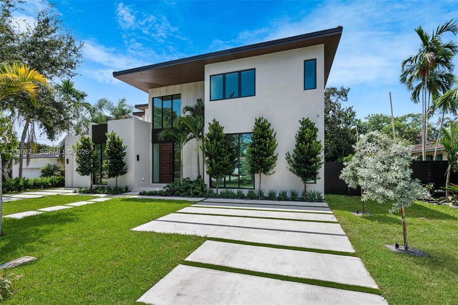 Front exterior of a new home in , Miami Shores, FL, highlighting curb appeal (Image 30). Front exterior of a new home in , Miami Shores, FL, highlighting curb appeal (Image 30).
