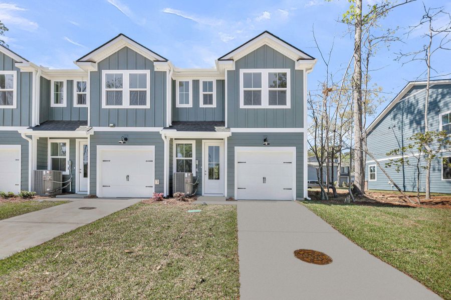 Front exterior of a new home in , Summerville, SC, highlighting curb appeal (Image 20).