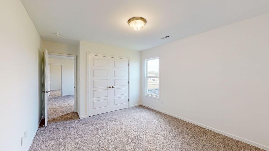 Representative unfurnished interior of a home built from the Yorkshire A by JC Jackson Homes,LLC in Heritage Pointe, Newport (Image 32).