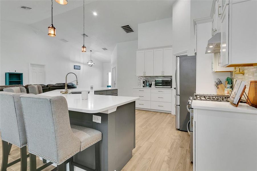 Kitchen- complete with Quartz countertops, STAINLESS STEEL appliances, and large CENTER ISLAND Kitchen- complete with Quartz countertops, STAINLESS STEEL appliances, and large CENTER ISLAND