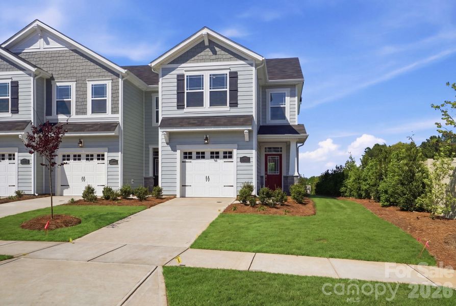 Front exterior of a new home in Arbor Chase, Clover, SC, highlighting curb appeal (Image 2).