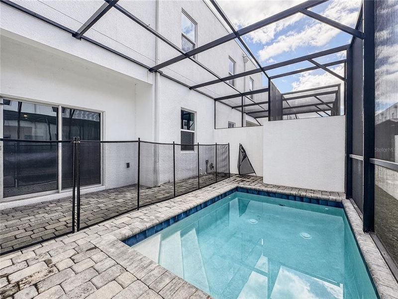 Exterior details and patio area of a home in , Davenport (Image 32).