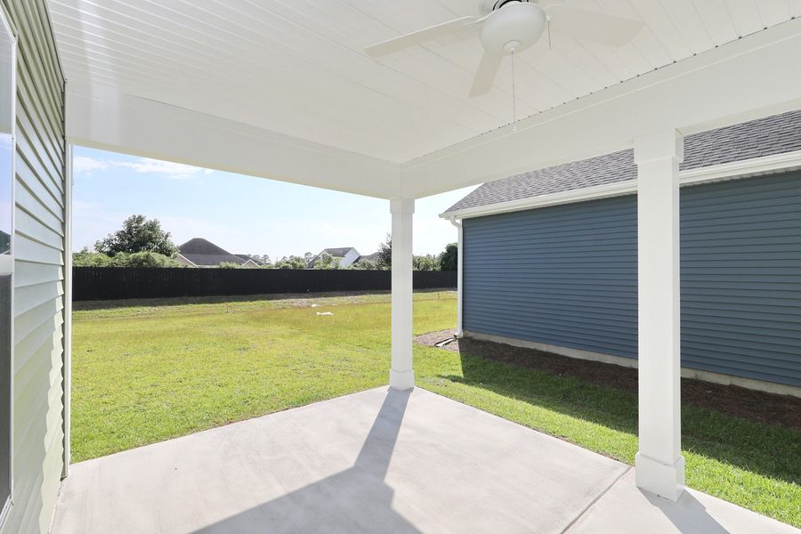 Exterior details and patio area of a home in Arcadia, Myrtle Beach (Image 2).