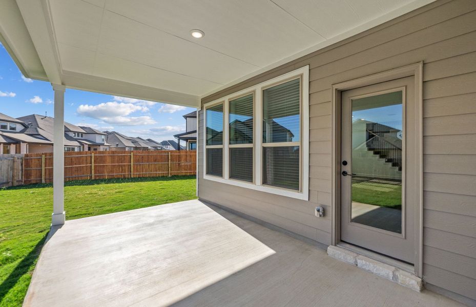 Exterior details and patio area of a home in Santa Rita Ranch, Liberty Hill (Image 28).