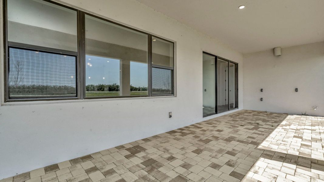 The Backyard of a DRB Homes Grand Hawk which is offered as a home plan at Serengeti in Spring Hill, FL.