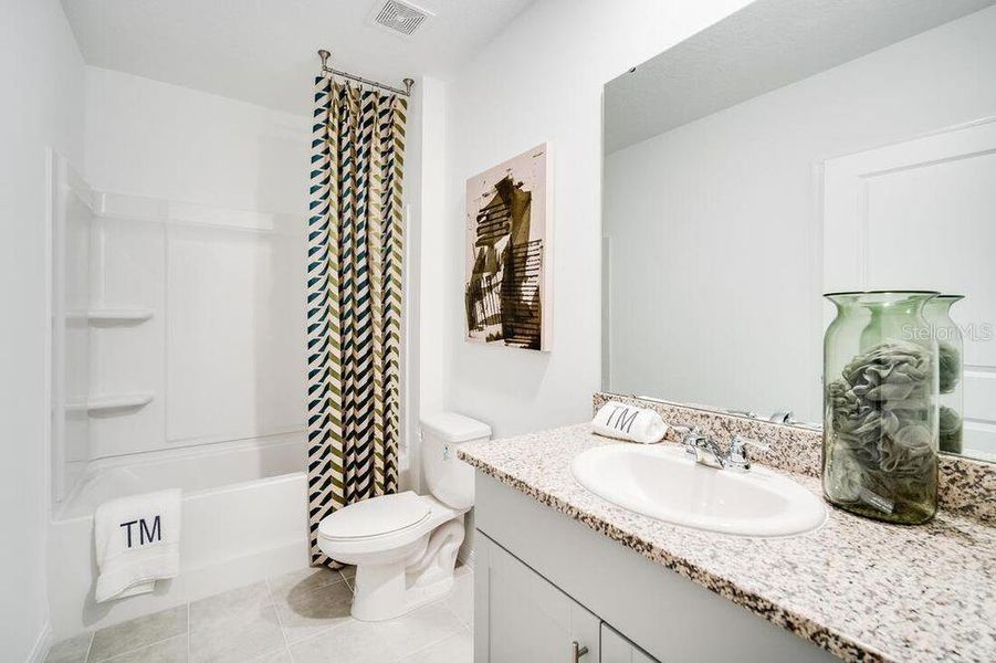 Furnished interior view inside a new home in Waterstone, Groveland (Image 22).