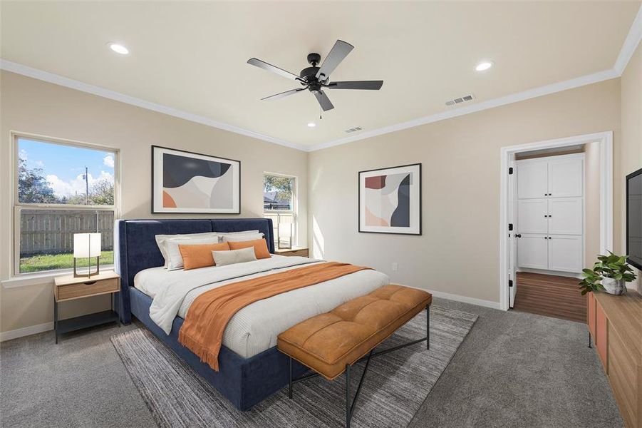 Carpeted bedroom with recessed lighting, ornamental molding, and a ceiling fan.This picture has been virtually staged.
