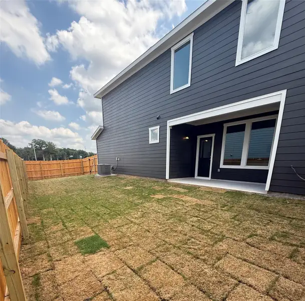 Front exterior of a new home in Valverde, Bastrop, TX, highlighting curb appeal (Image 2). Front exterior of a new home in Valverde, Bastrop, TX, highlighting curb appeal (Image 2).