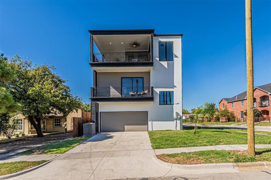 Front exterior of a new home in , Dallas, TX, highlighting curb appeal (Image 20).