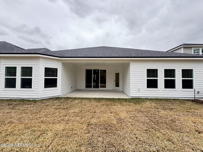 Exterior details and patio area of a home in Hyland Trail, Green Cove Springs (Image 25).