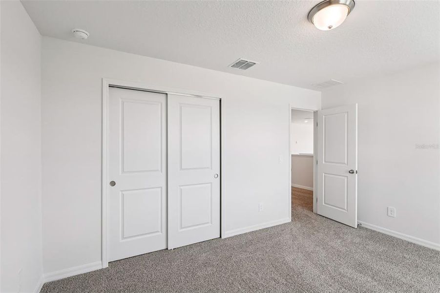 Spacious, unfurnished interior of a new home in Crosswinds - Signature Series, Haines City (Image 34).