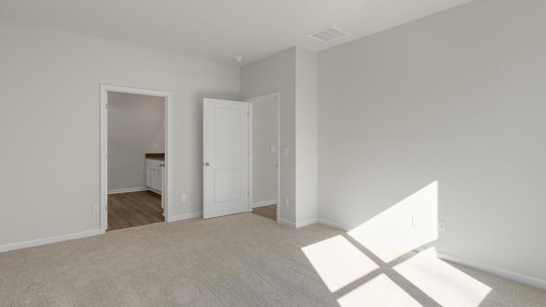 Spacious, unfurnished interior of a new home in Indigo Preserve, Leland (Image 20).
