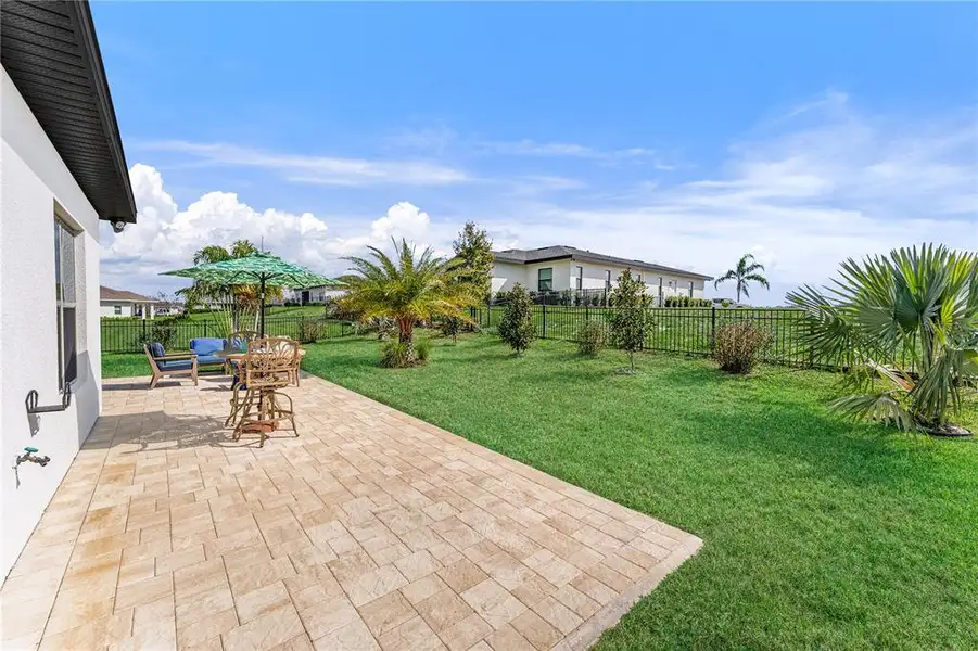 Exterior details and patio area of a home in , Auburndale (Image 4).