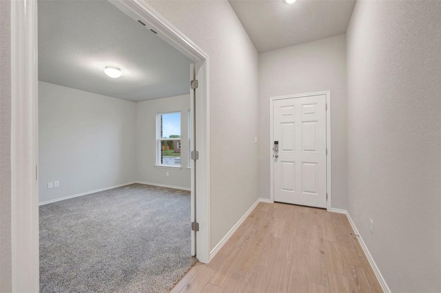 Spacious, unfurnished interior of a new home in Carillon, Manor (Image 13).