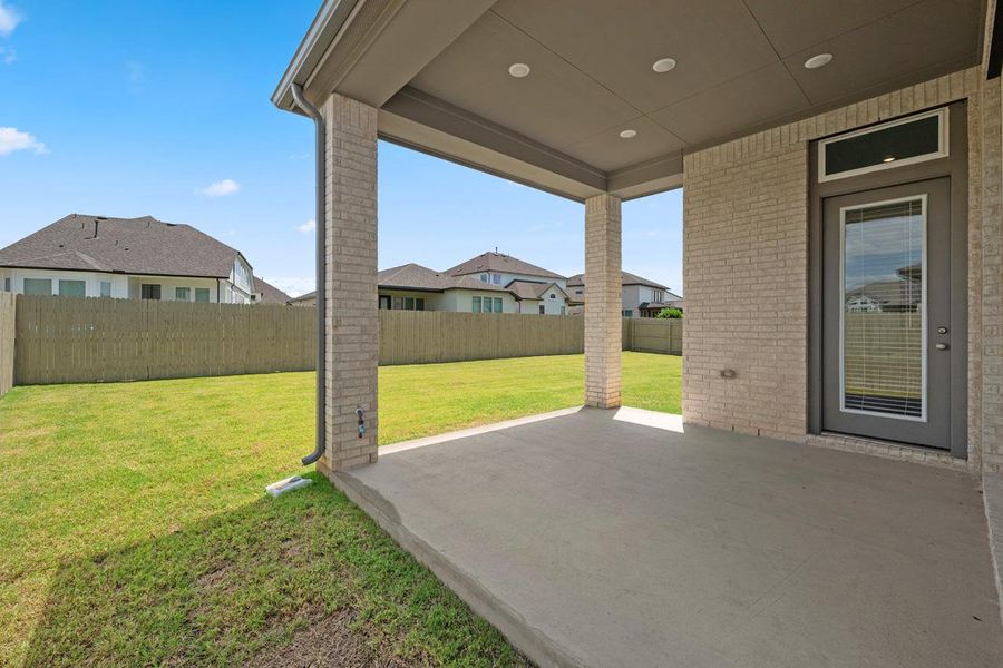 Exterior details and patio area of a home in Santa Rita Ranch, Liberty Hill (Image 19). Exterior details and patio area of a home in Santa Rita Ranch, Liberty Hill (Image 19).