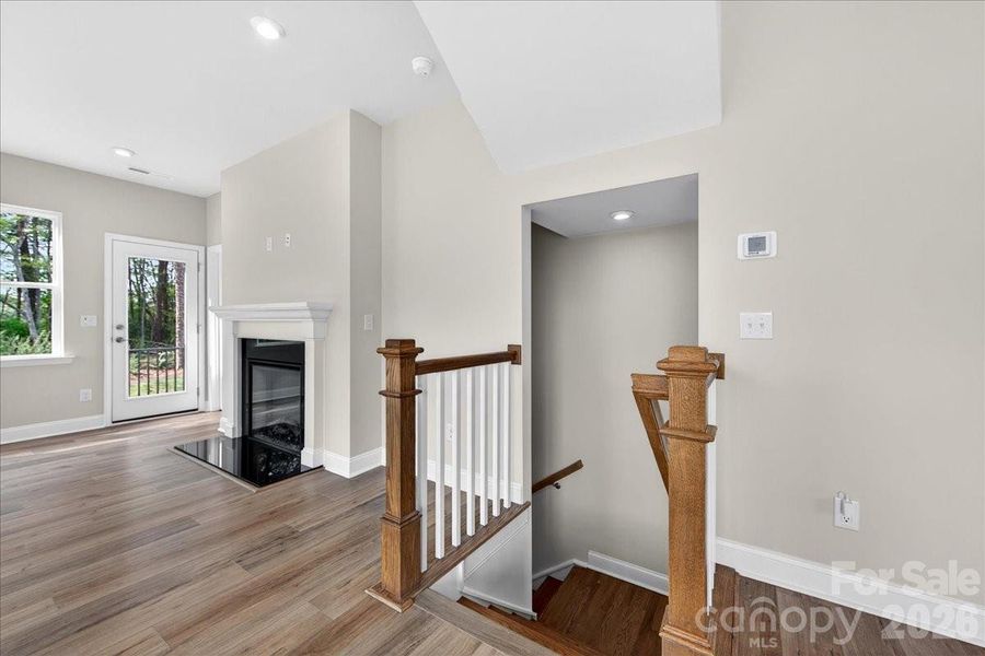 Second floor landing and open rail staircase