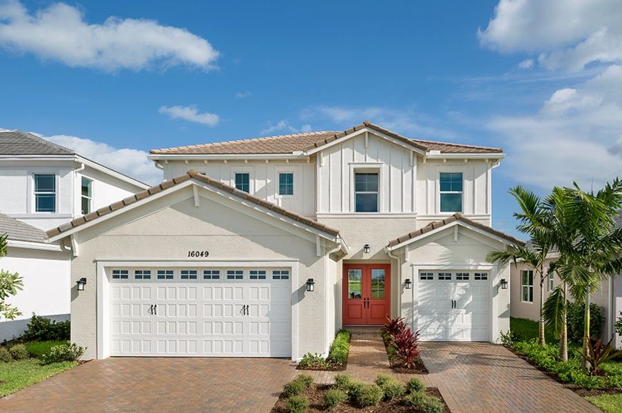 Front exterior of a new home in Westlake, Loxahatchee, FL, highlighting curb appeal (Image 2).