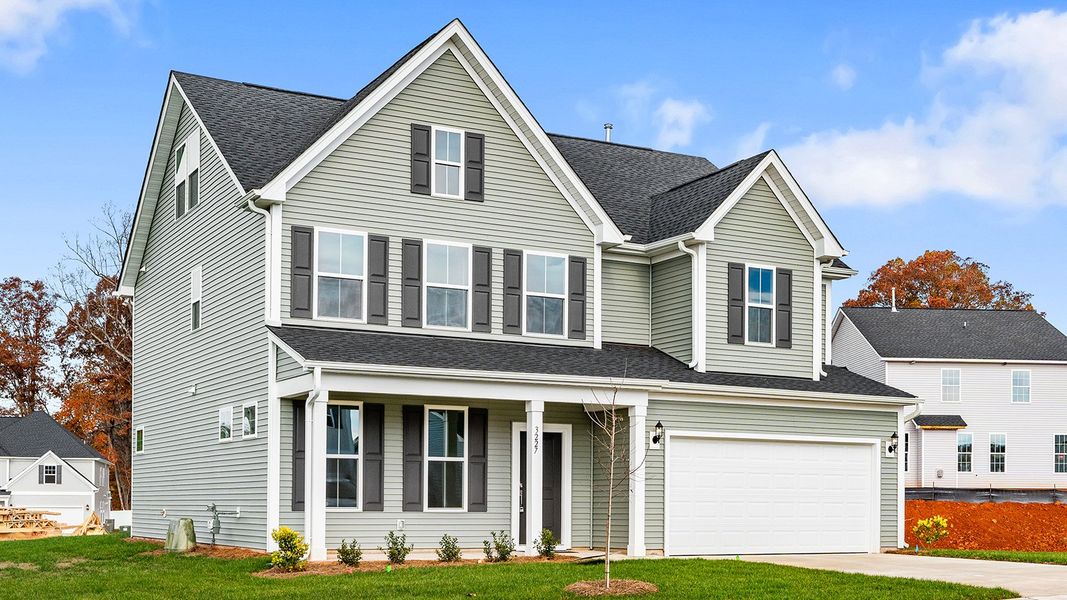 Front exterior of a new home in Hanes Lake, Winston-Salem, NC, highlighting curb appeal (Image 23).